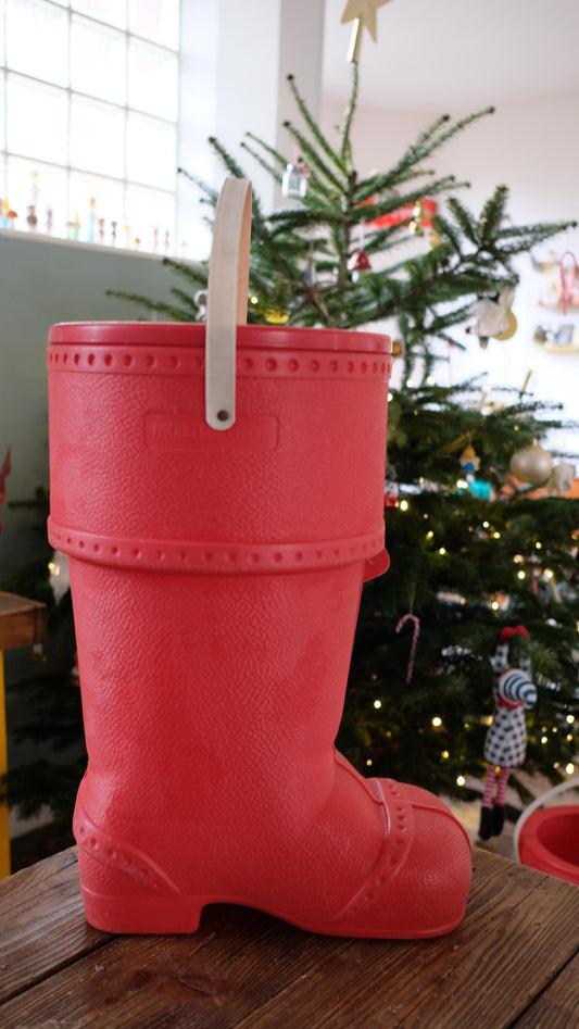 Baril de lessive publicitaire en forme de botte de père noël