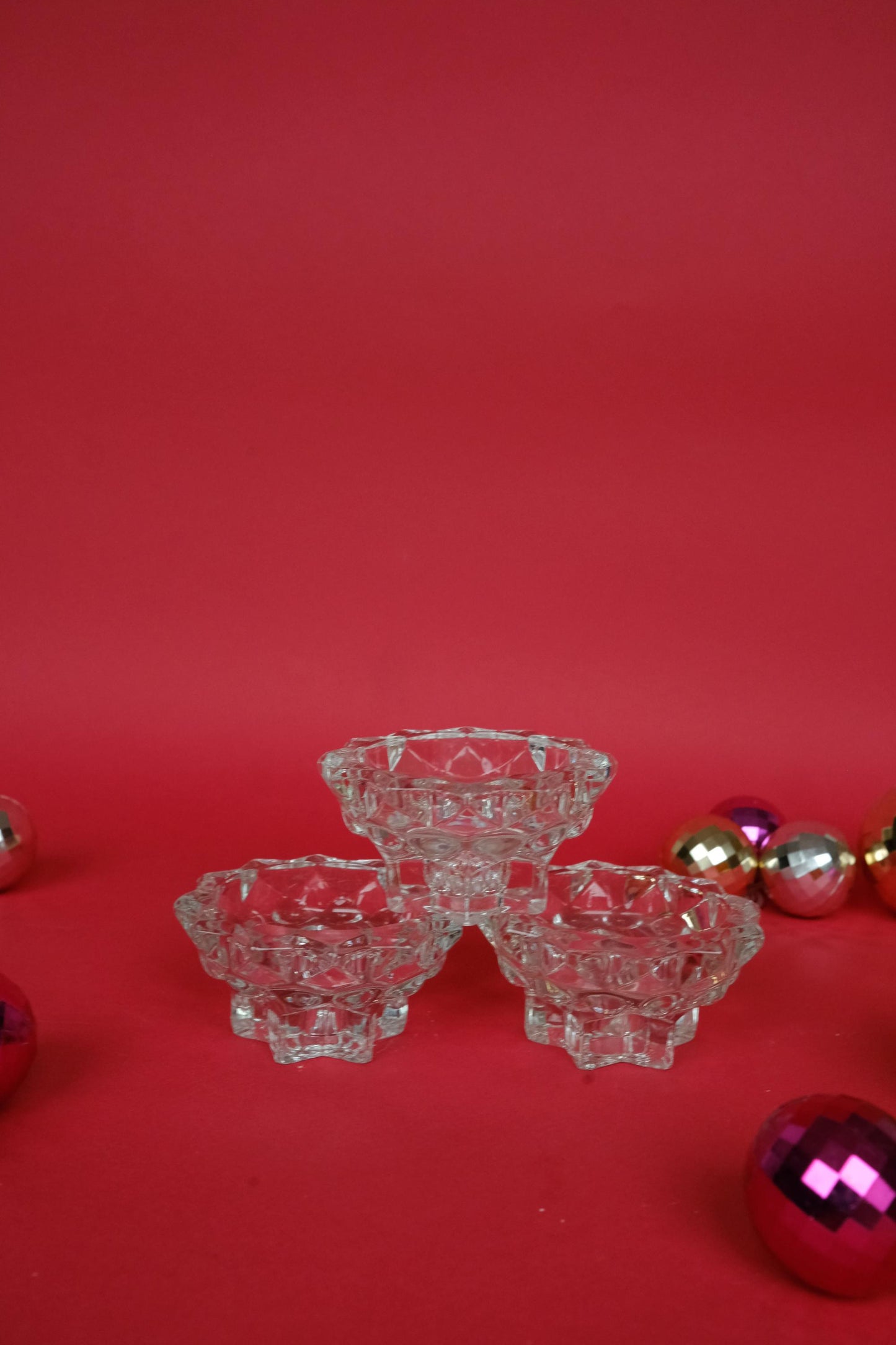 Bougeoirs en verre en forme d'étoile