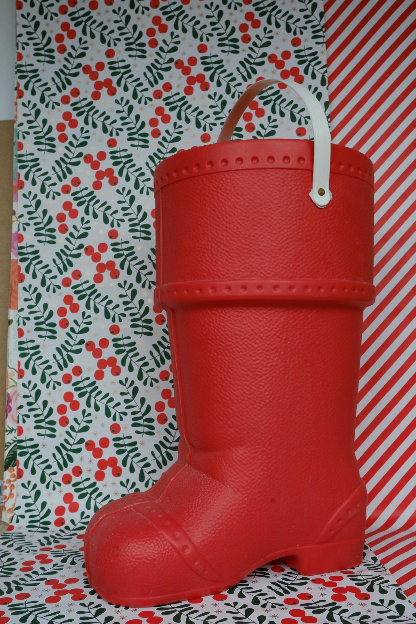 Baril de lessive en forme de botte du père noël
