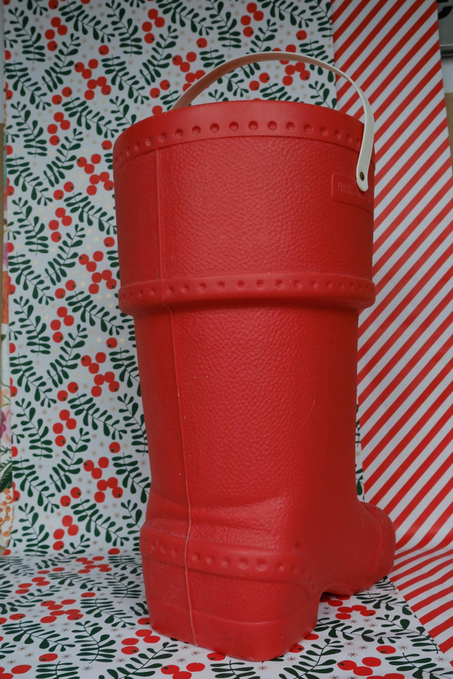 Baril de lessive en forme de botte du père noël