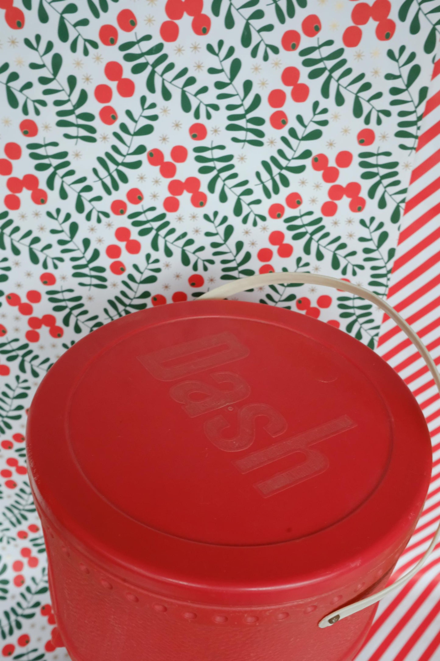 Baril de lessive en forme de botte du père noël