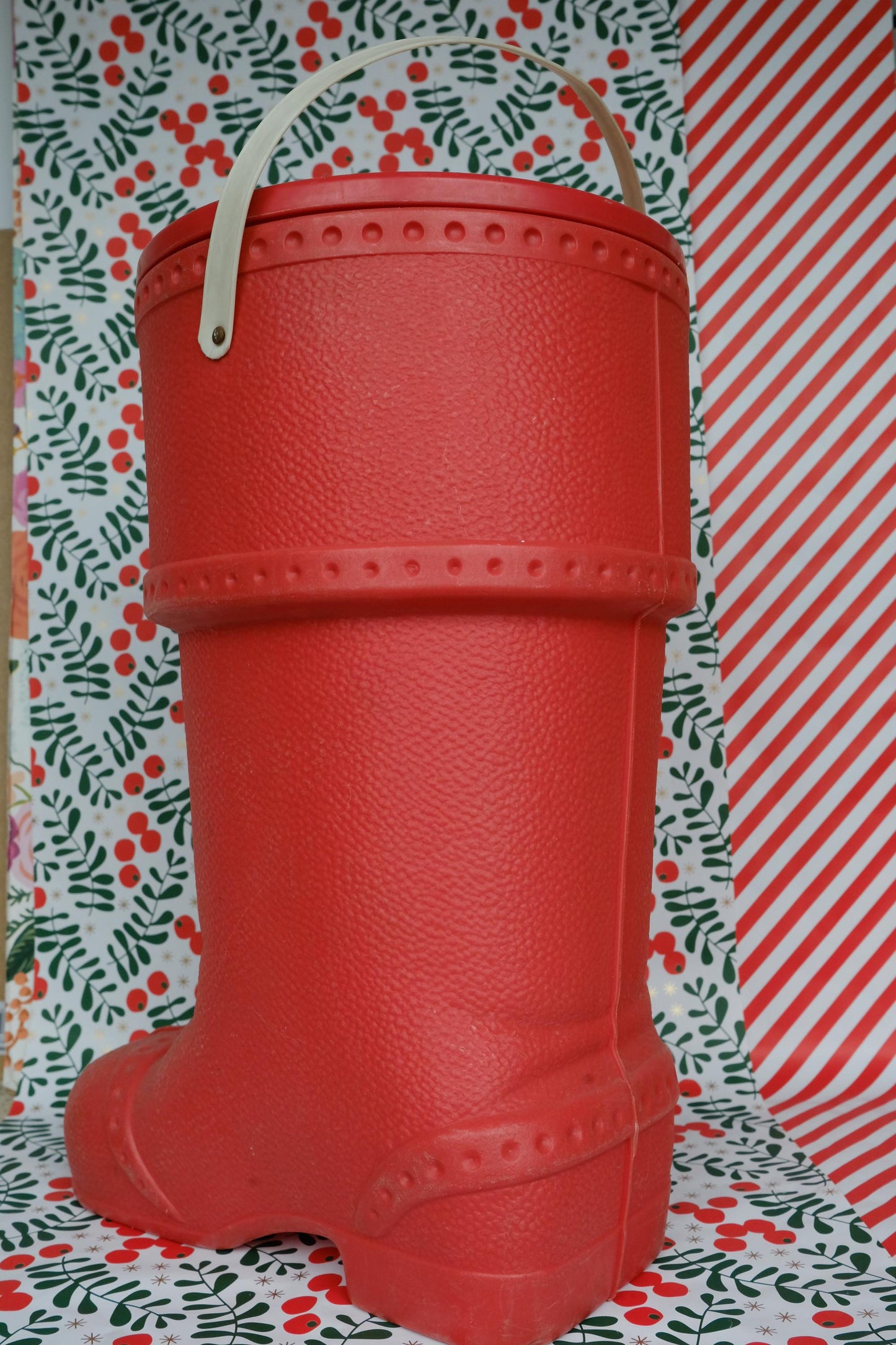 Baril de lessive en forme de botte du père noël