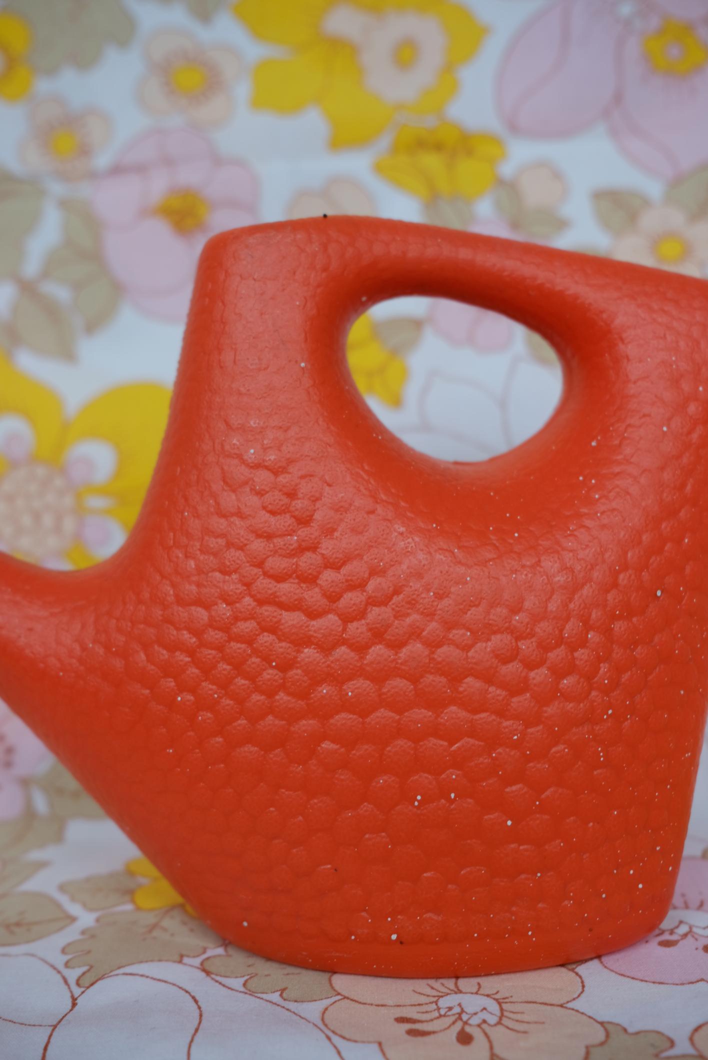 Arrosoir space age en plastique