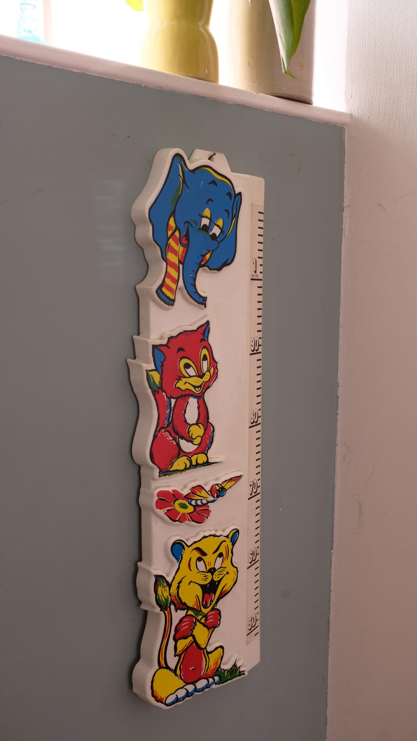 Toise vintage en plastique