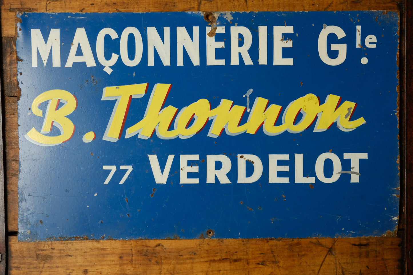 Tôle publicitaire peinte à la main