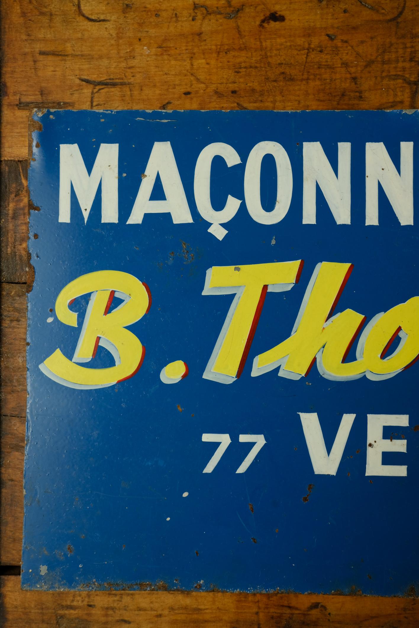 Tôle publicitaire peinte à la main