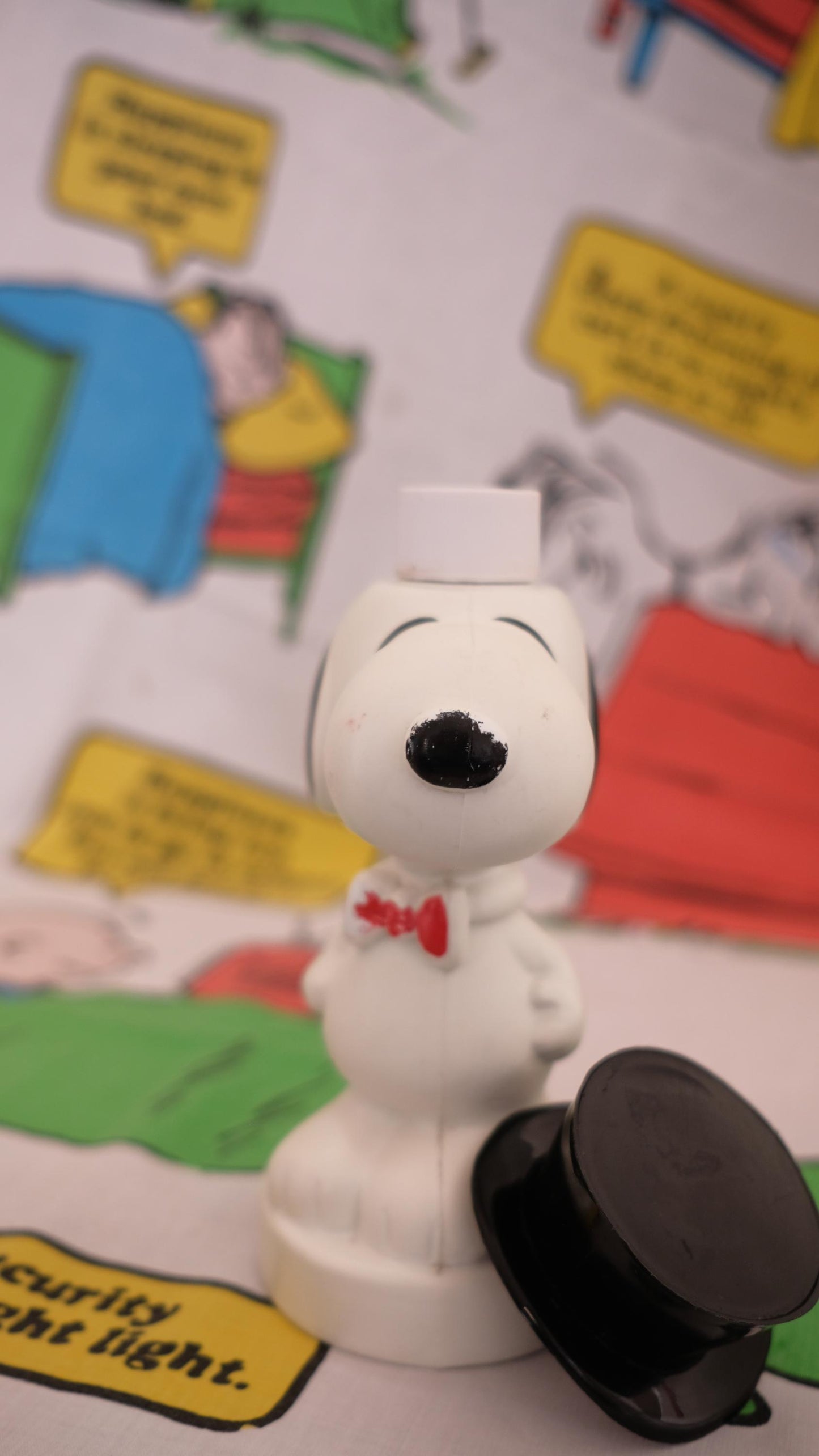 Bouteille de shampoing snoopy avec son haut de forme vintage