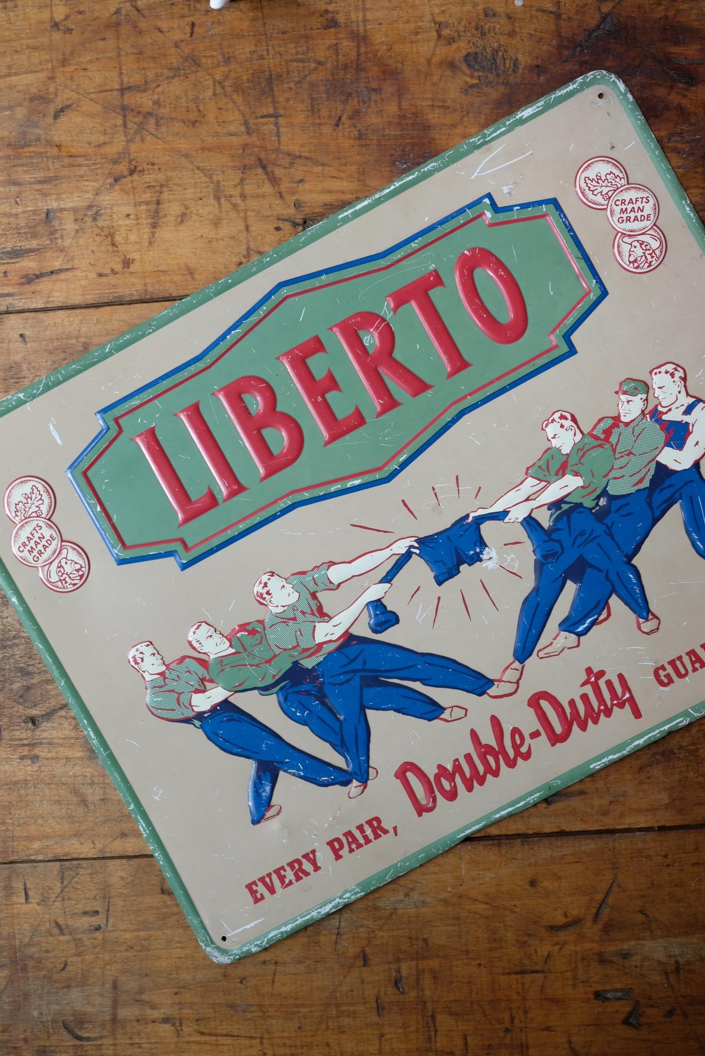 Plaque publicitaire Liberto en métal