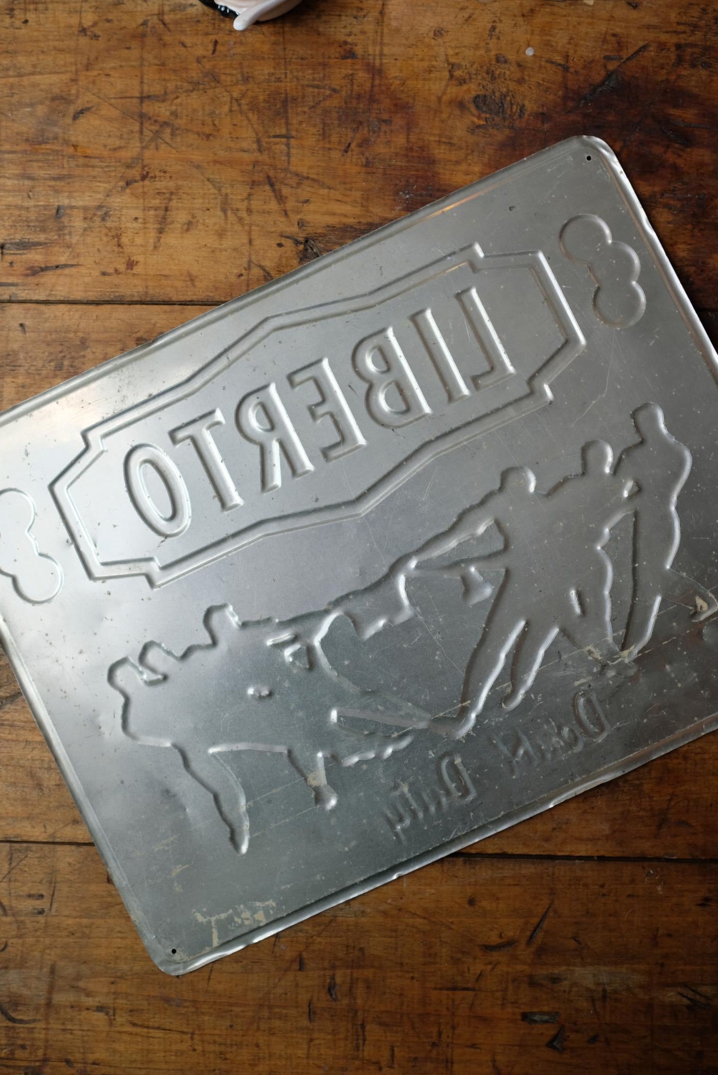 Plaque publicitaire Liberto en métal