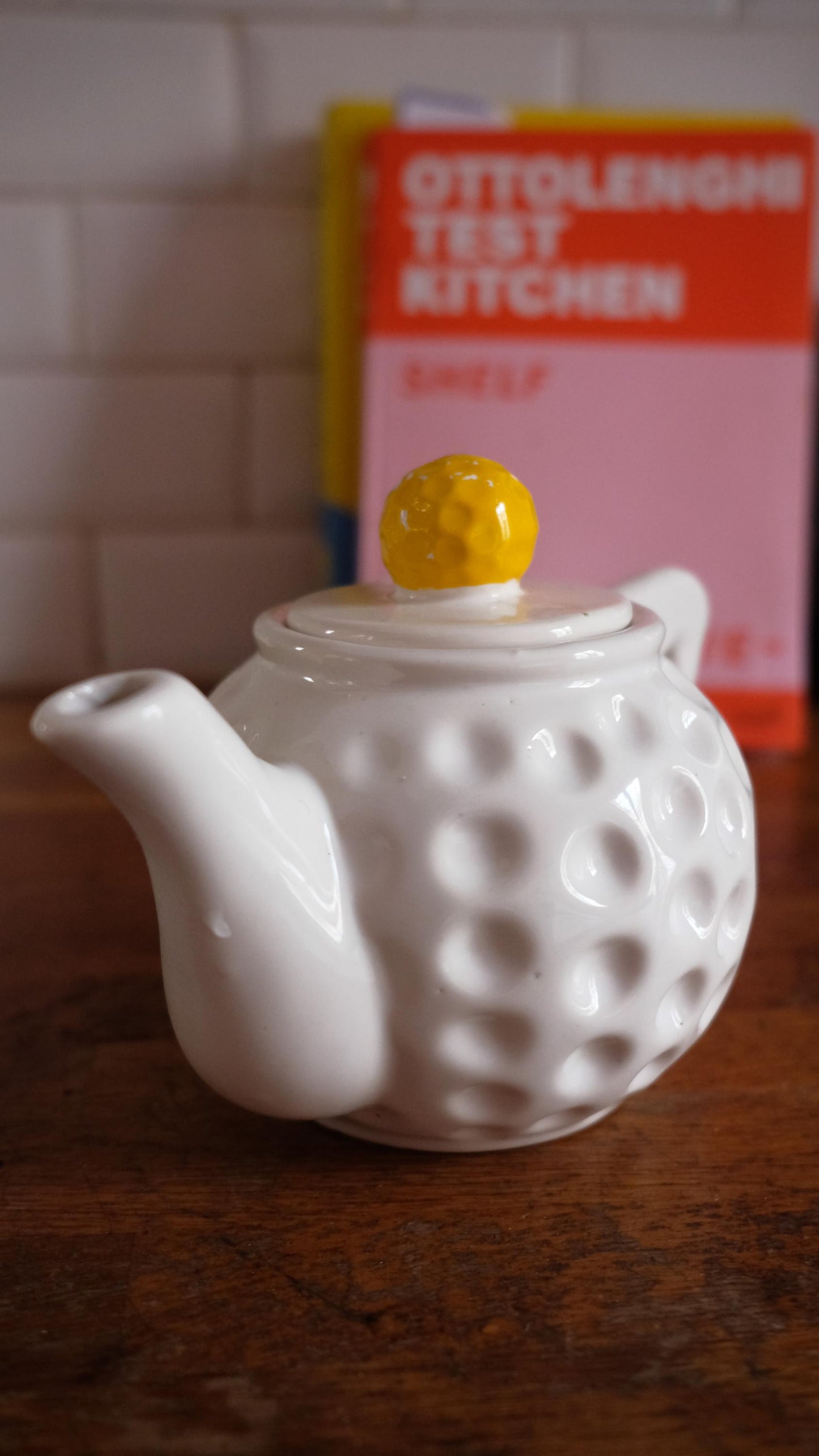 Théière vintage en forme de balles de golf