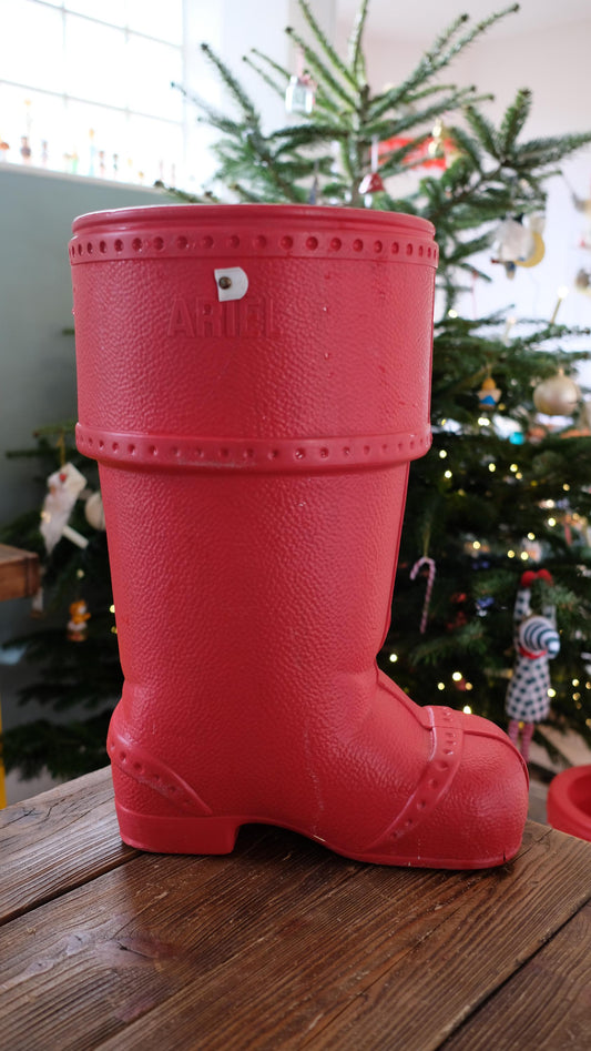 Baril de lessive en forme de botte du père noël procter et Gamble