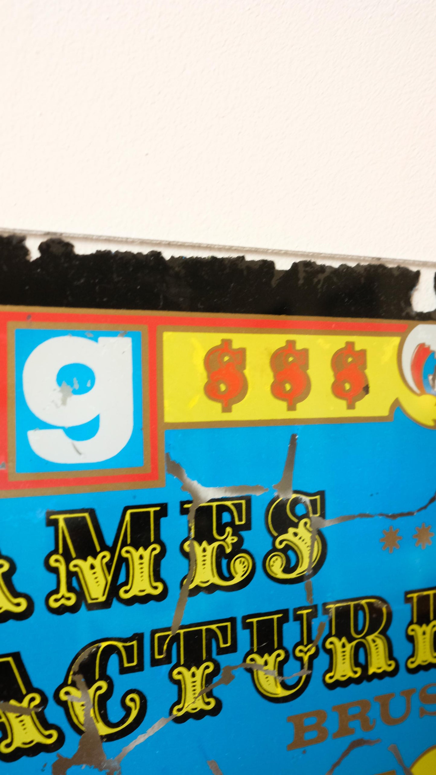 Plaque de machine à sous vintage en verre peint