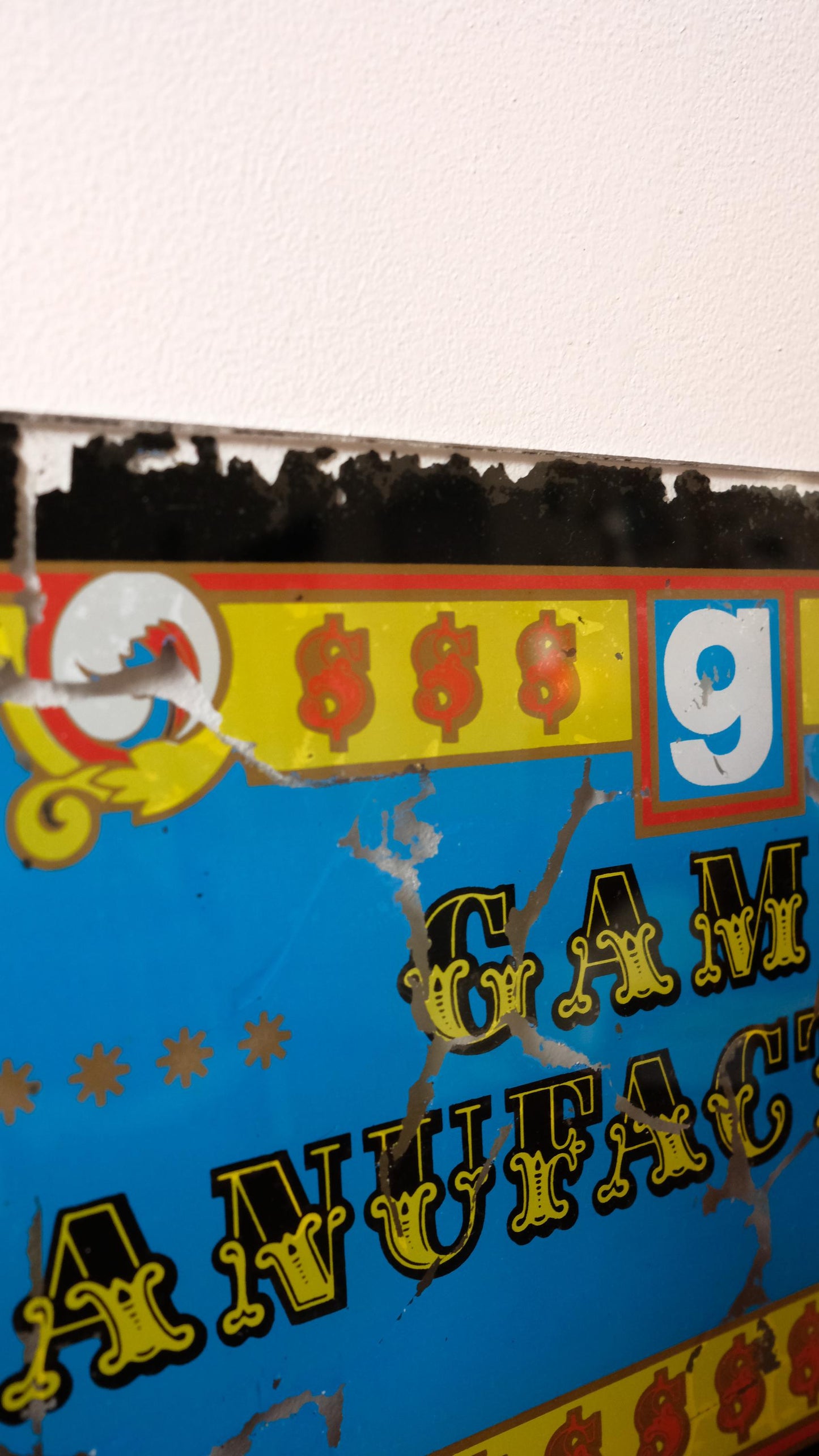 Plaque de machine à sous vintage en verre peint