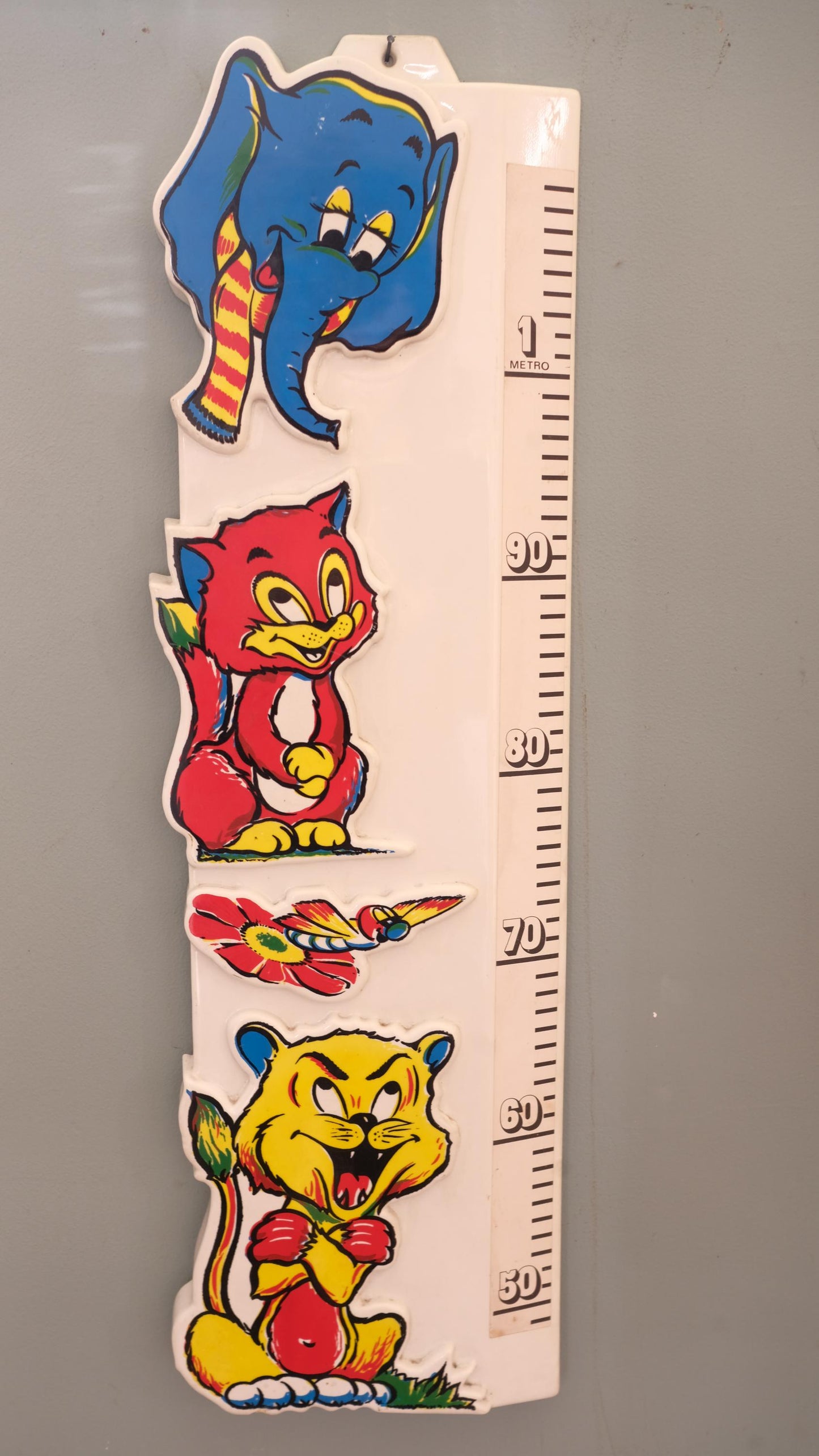 Toise vintage en plastique