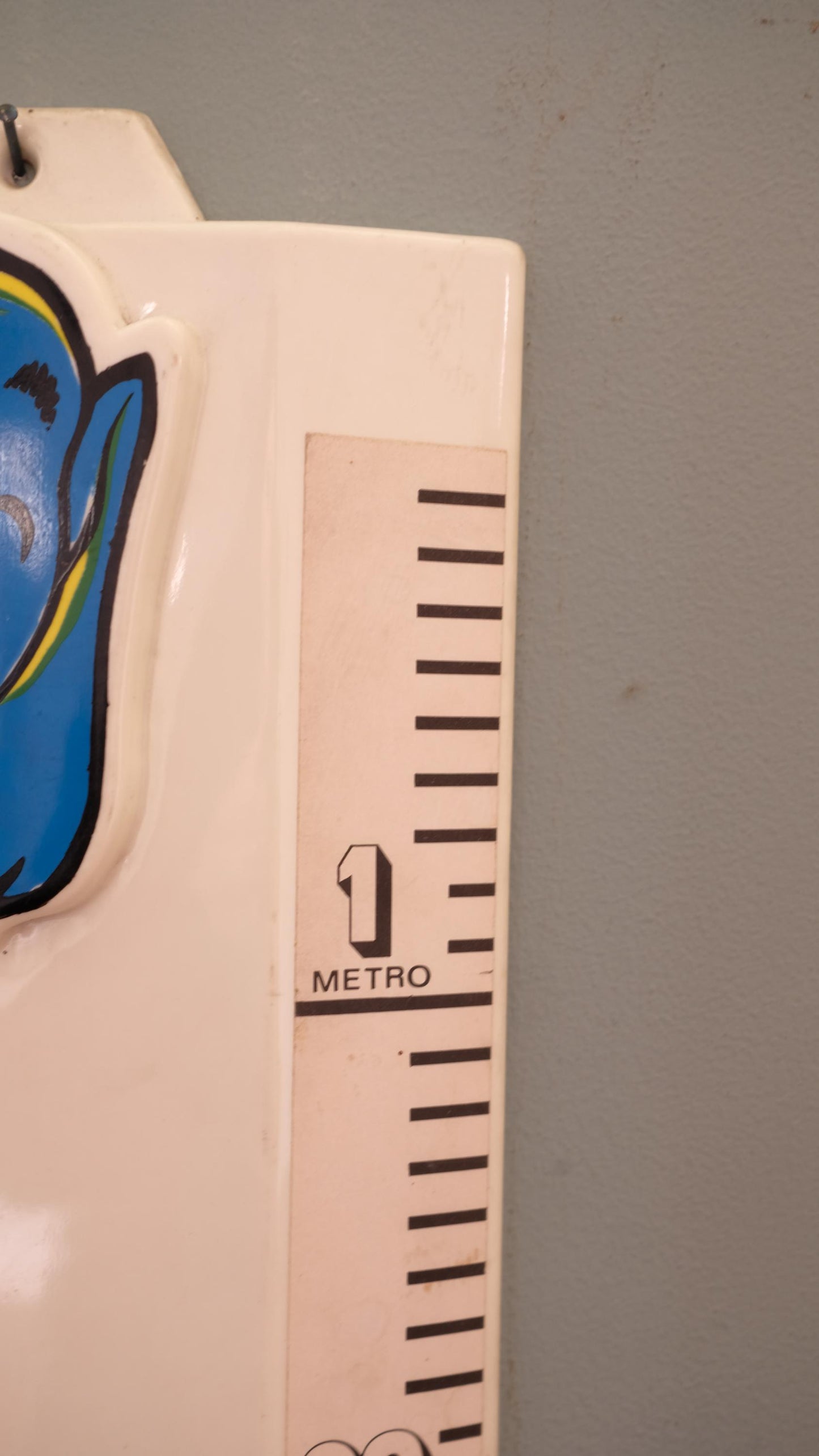 Toise vintage en plastique