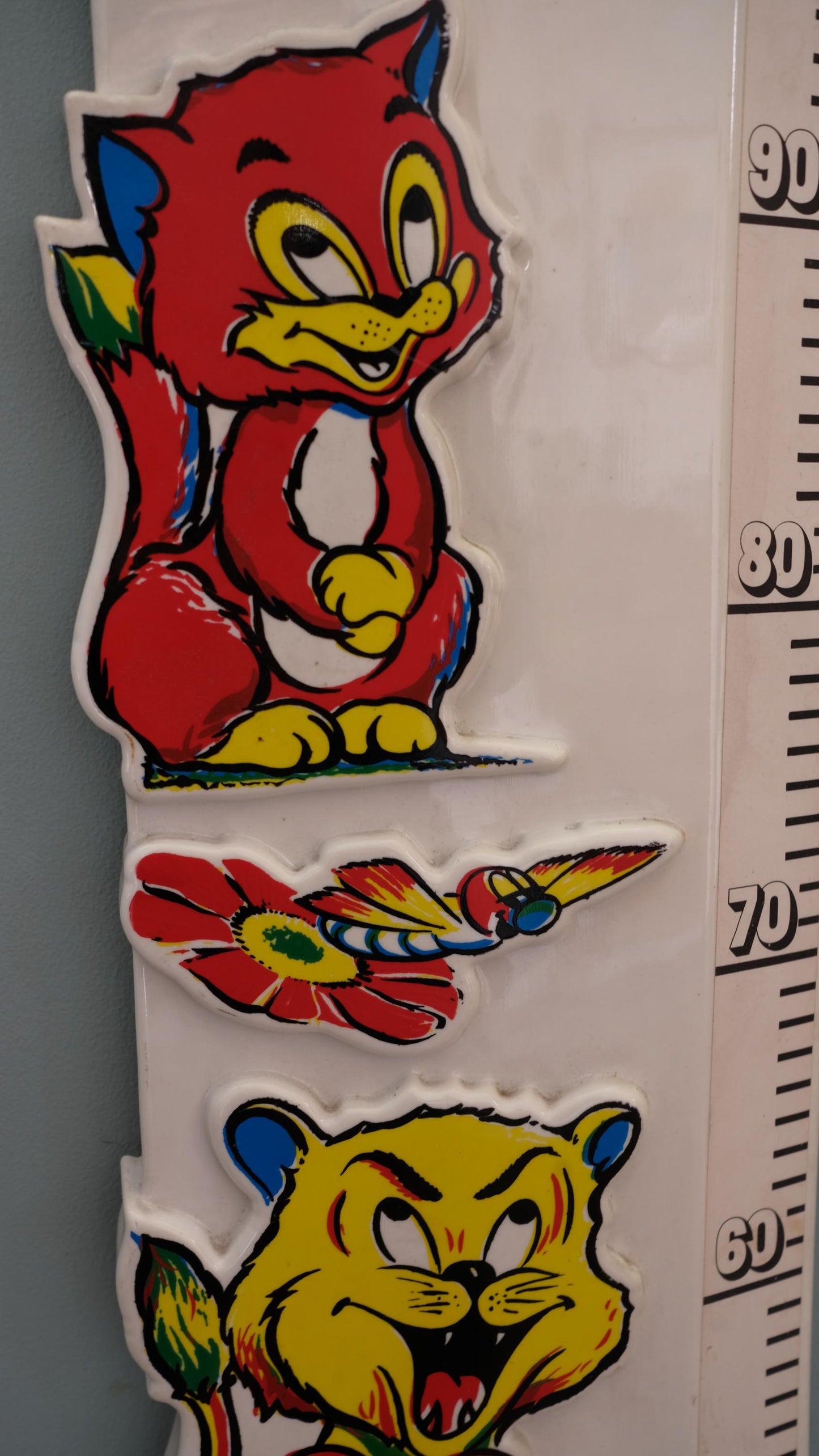 Toise vintage en plastique