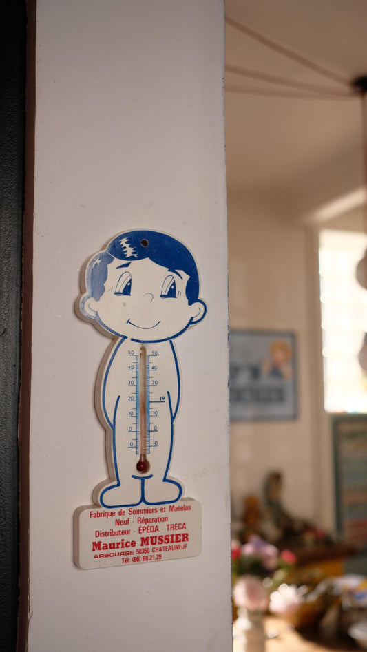 Thermomètre publicitaire vintage en plastique