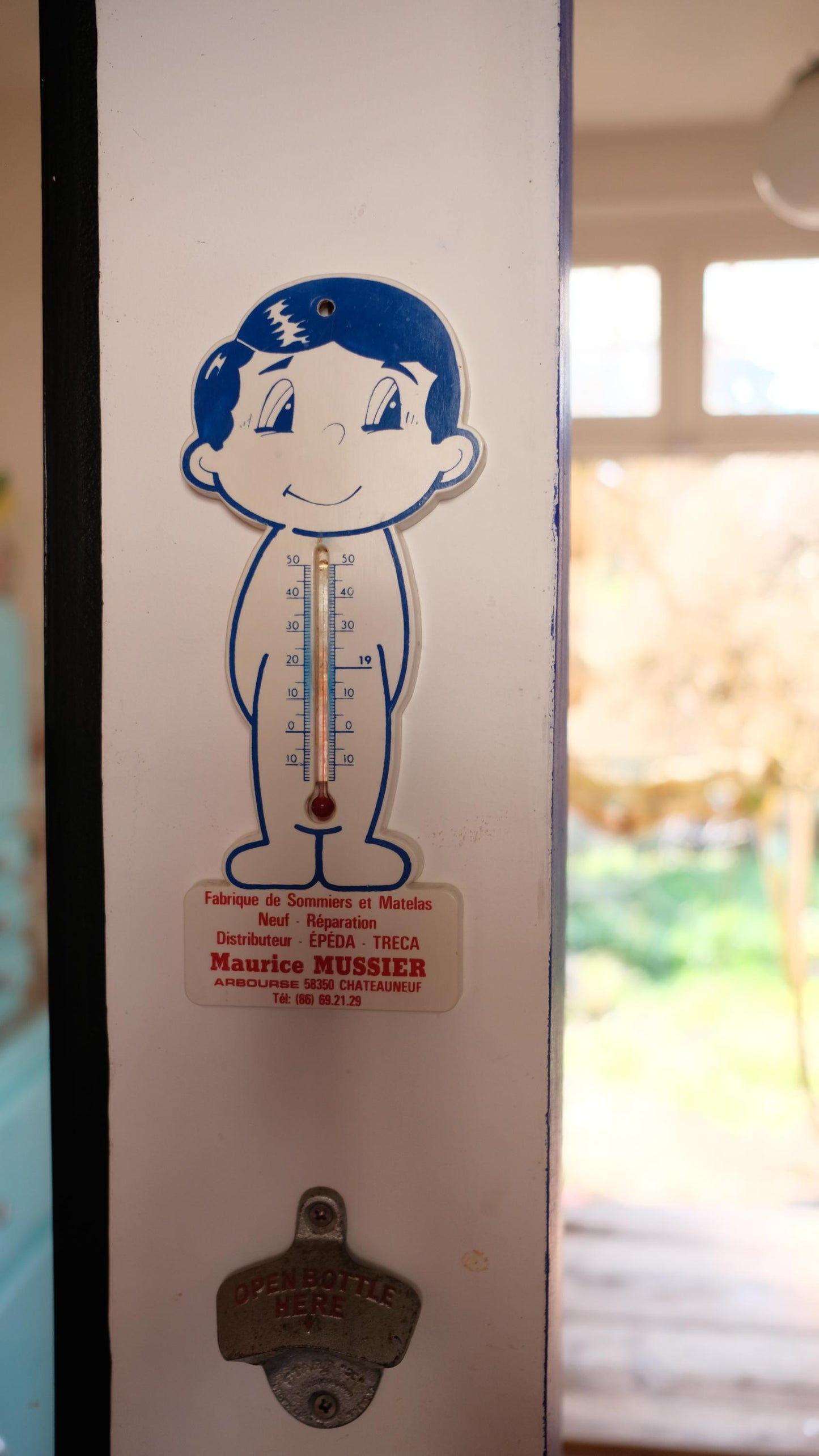 Thermomètre publicitaire vintage en plastique