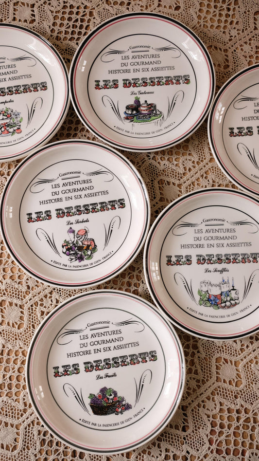 Ensemble de six assiettes à dessert Gien vintage "les aventures du gourmand"