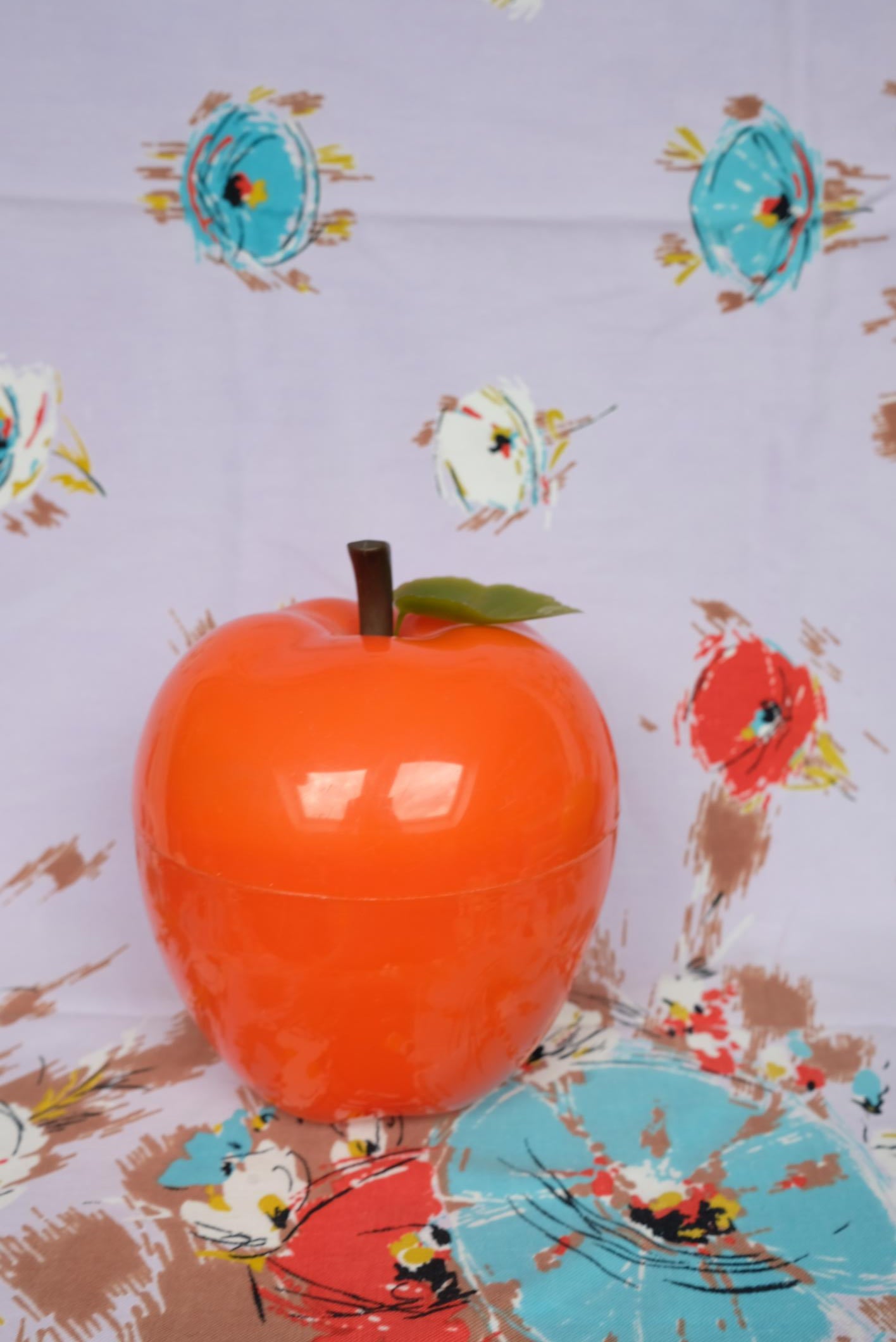 Pomme à glaçons en plastique orange