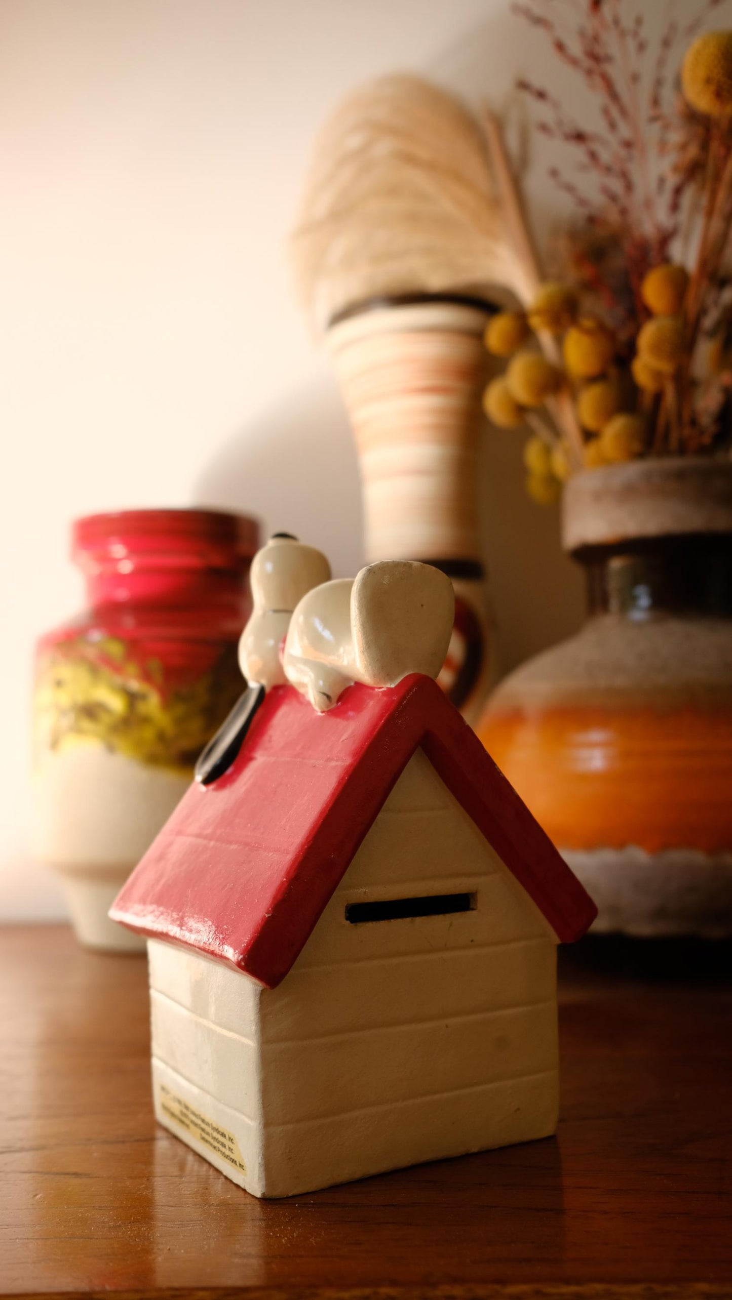 Tirelire Snoopy sur sa niche vintage