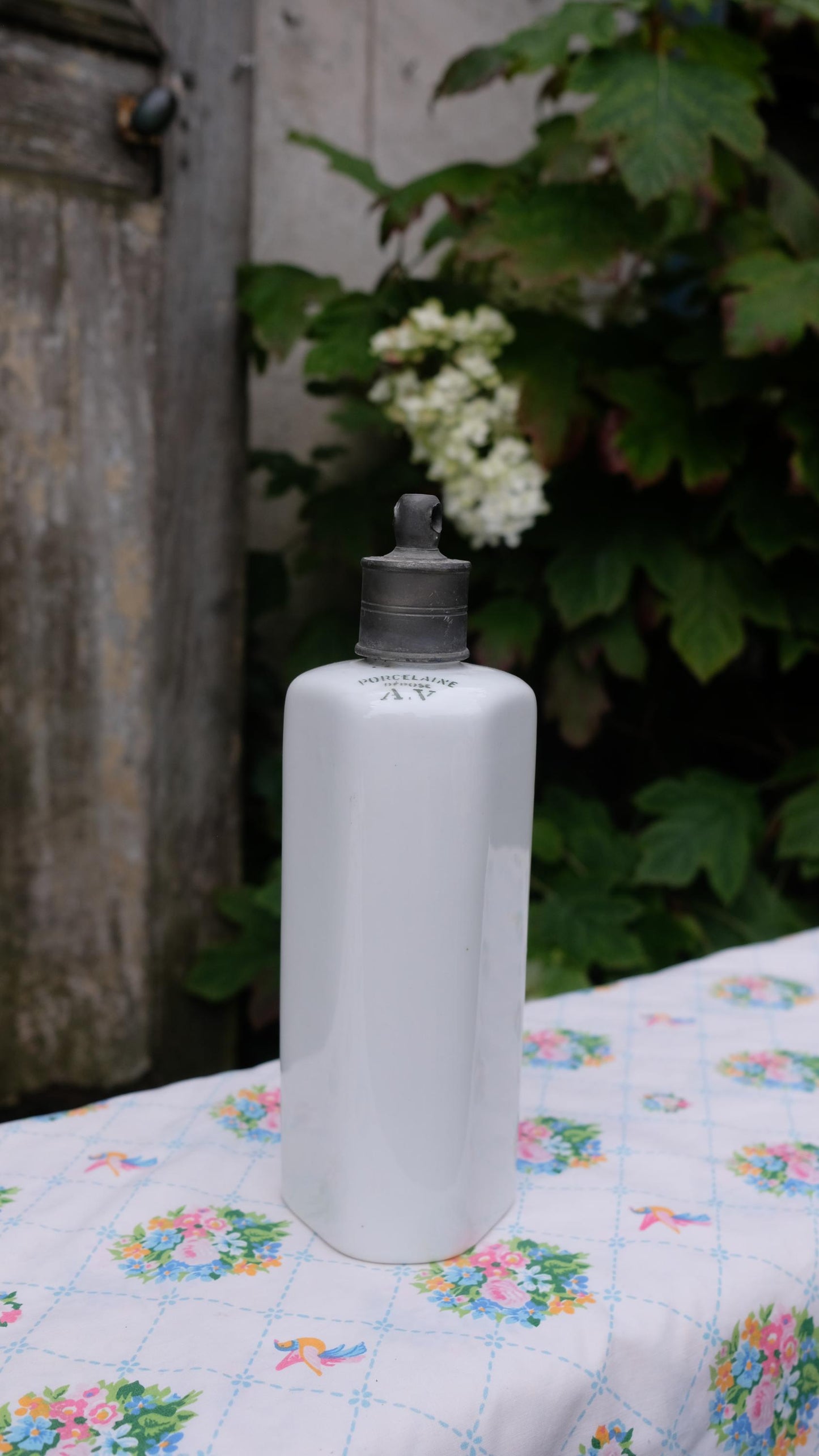 Bouillotte vintage en porcelaine