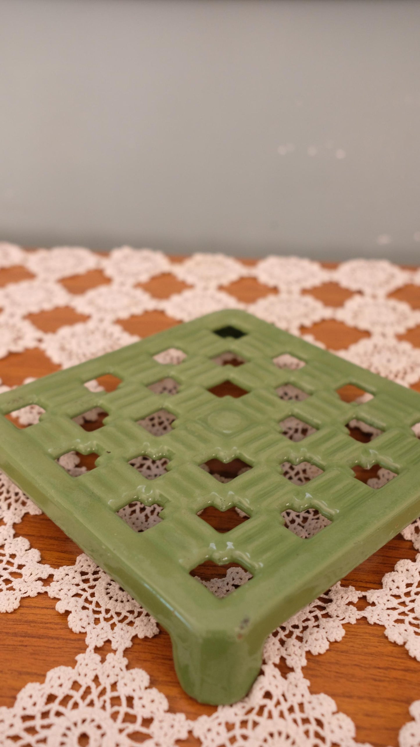 Dessous de plat vintage en fonte émaillée