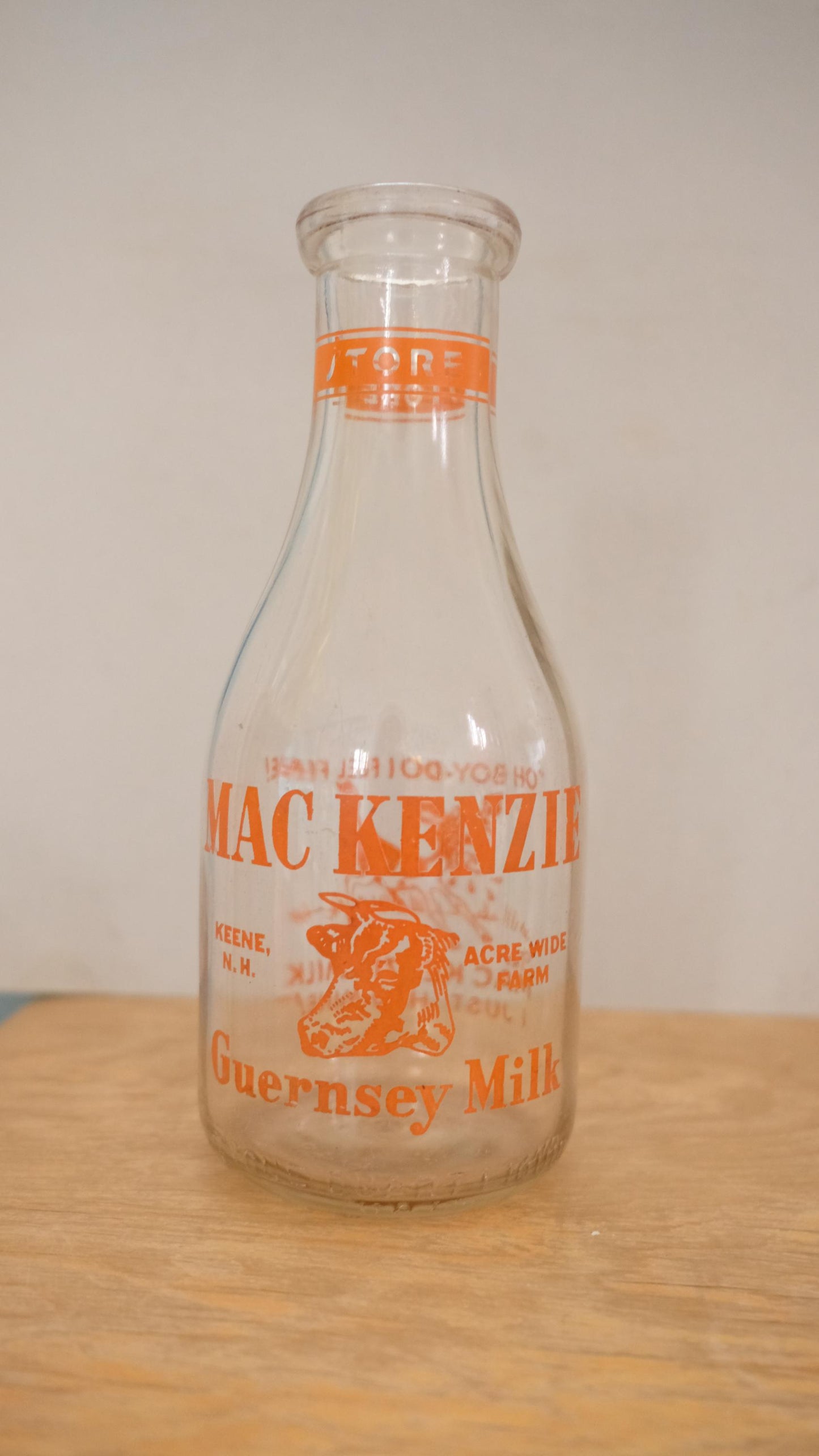 Bouteille de lait Mac Kenzie vintage sérigraphiée