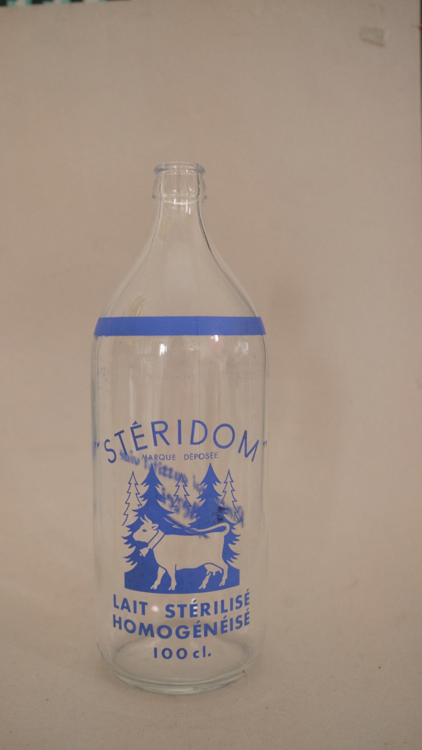 Bouteille de lait publicitaire stéridom vintage