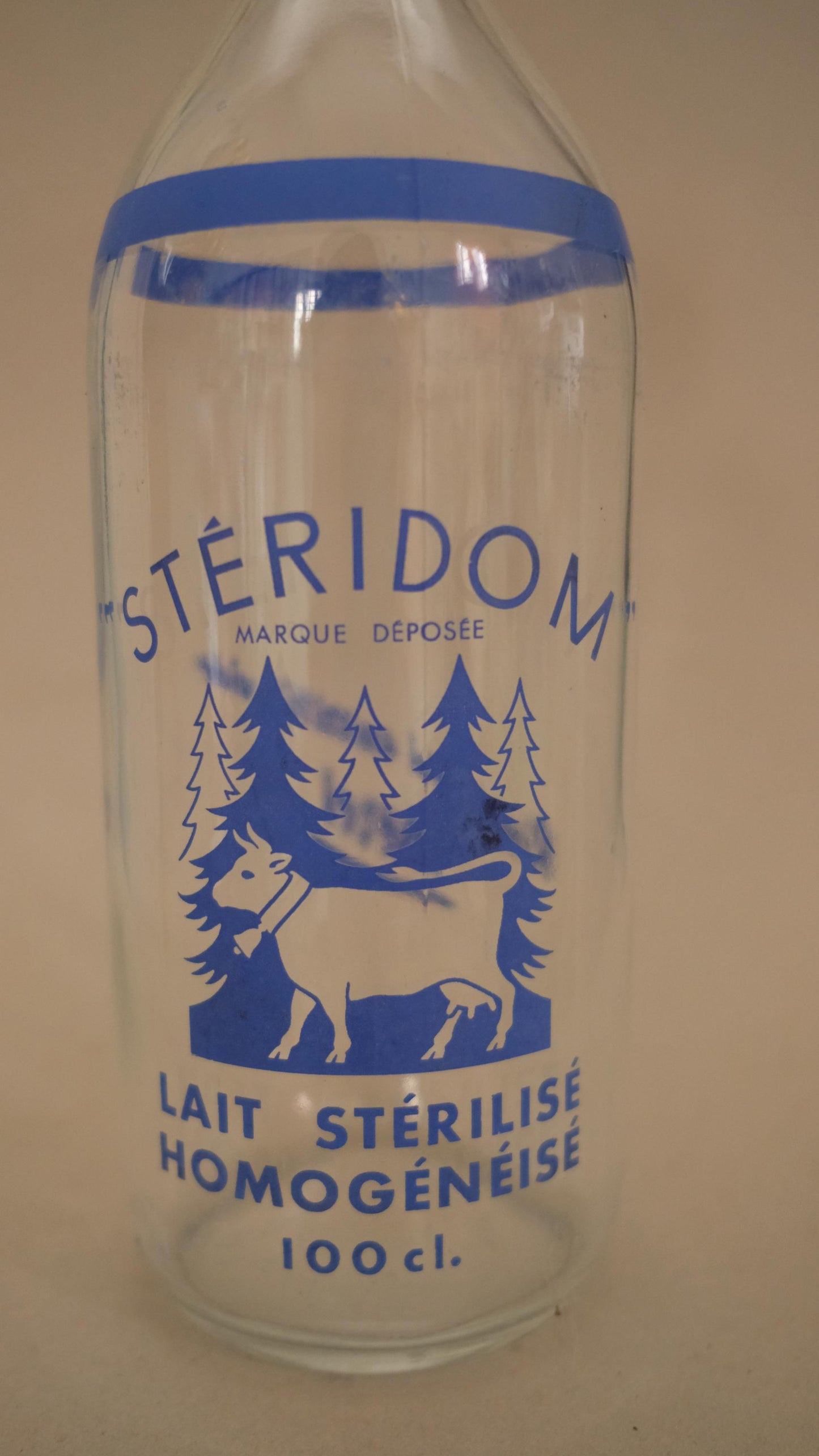 Bouteille de lait publicitaire stéridom vintage