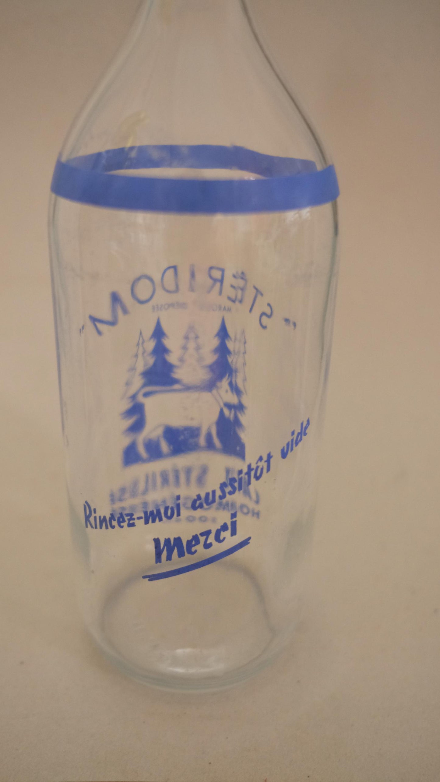 Bouteille de lait publicitaire stéridom vintage