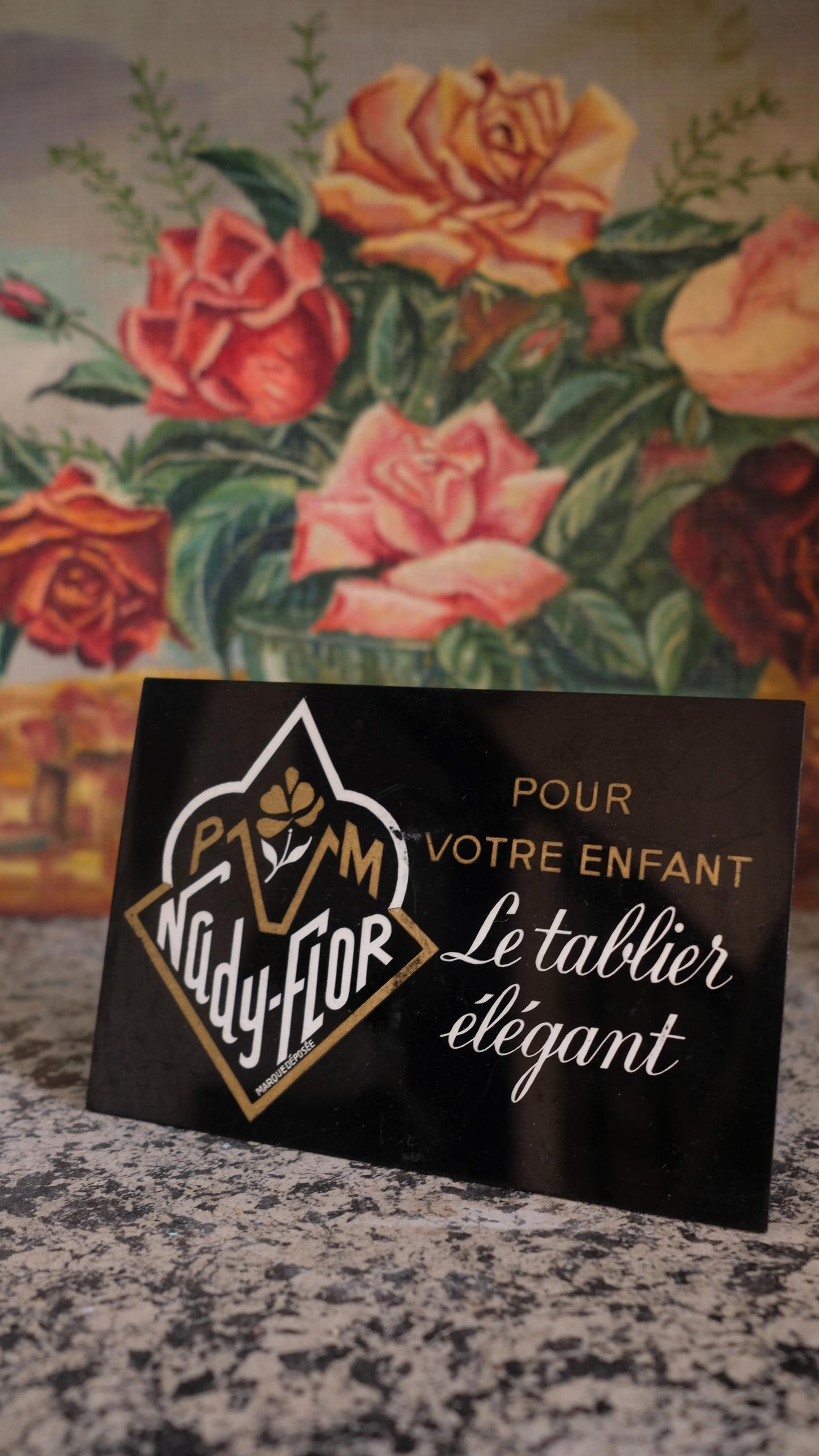 Panneau publicitaire en plastique "le tablier élégant"