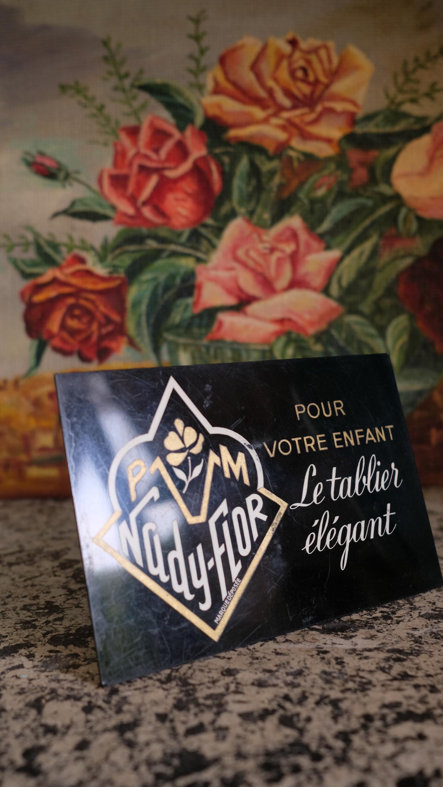 Panneau publicitaire en plastique "le tablier élégant"